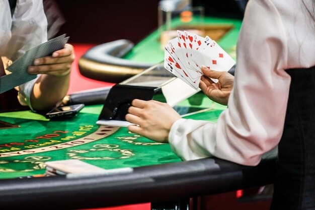 Mobile phone displaying live Teen Patti table with dealer and player cards